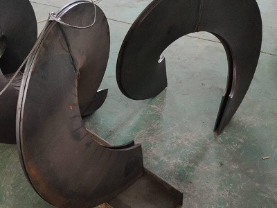 What are the common causes of wear of spiral vane